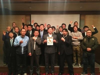 読売新聞・府下泉州支部の従業員一同の集合写真